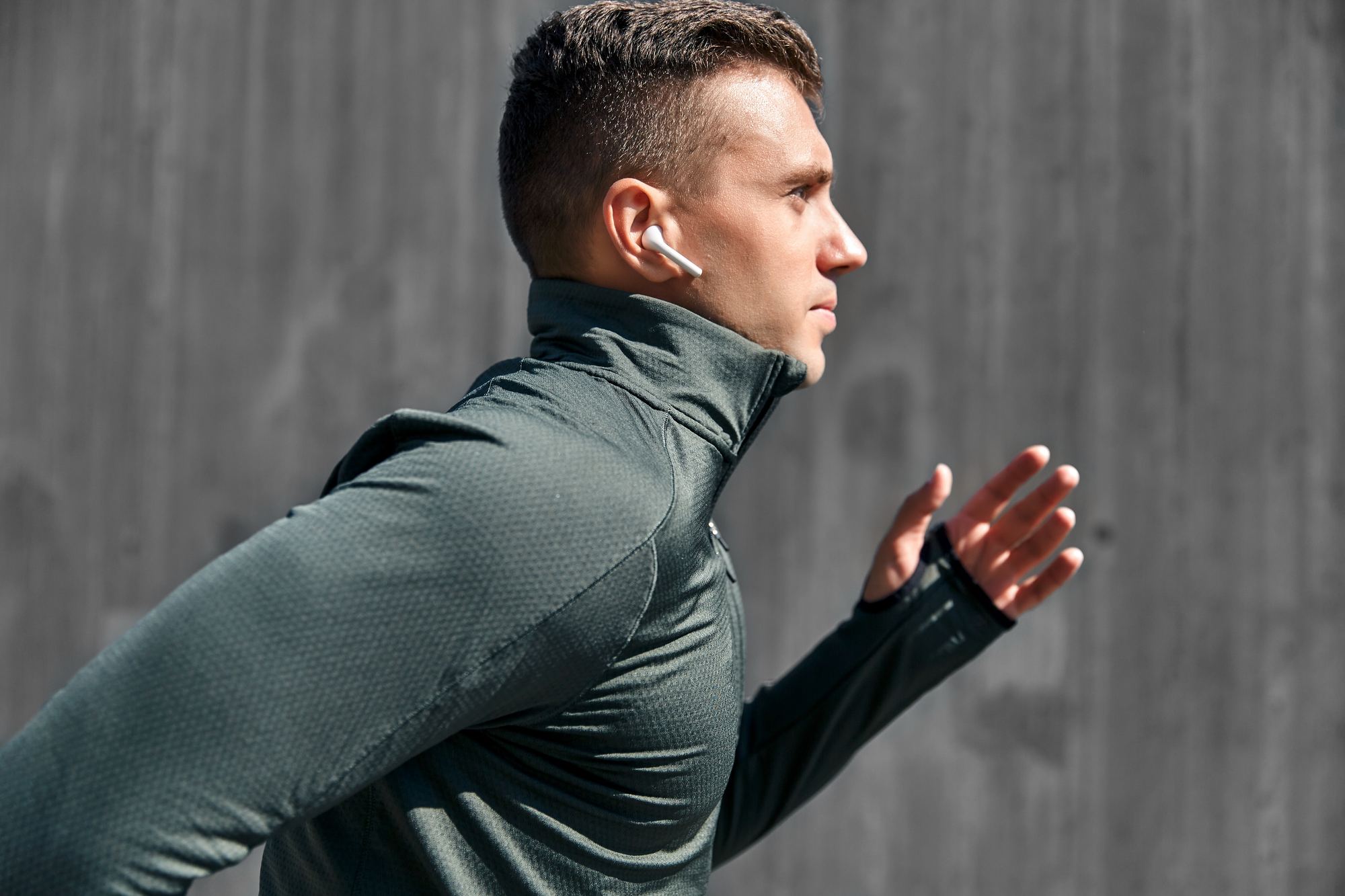 Active man in his fifties stretching outdoors